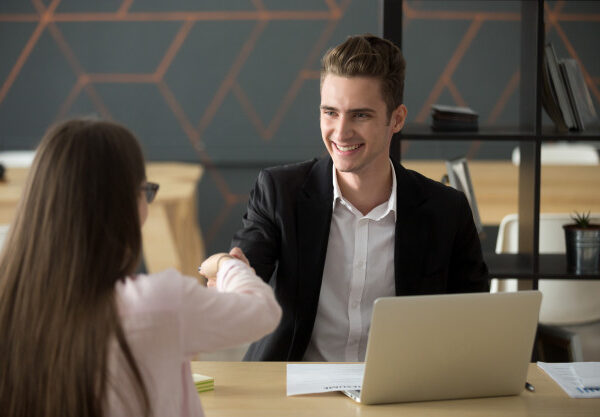 smiling-hr-employer-handshaking-successful-job-applicant-hiring-greeting_1163-4102